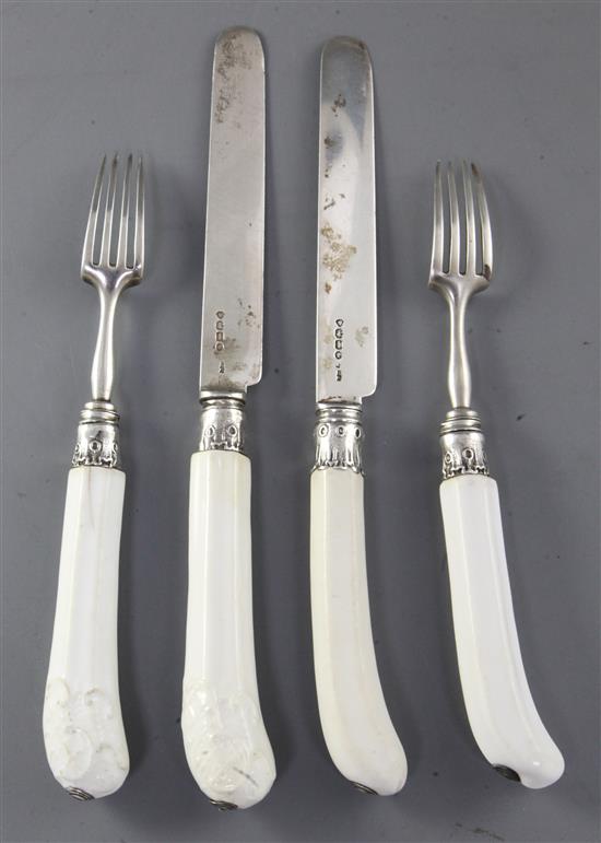 Two pairs of white soft paste porcelain handled knives and forks, possibly French mid 18th century, 18 - 22.5cm